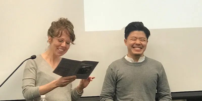 Picture of Prof. Fennell and a student from 2018 symposium.